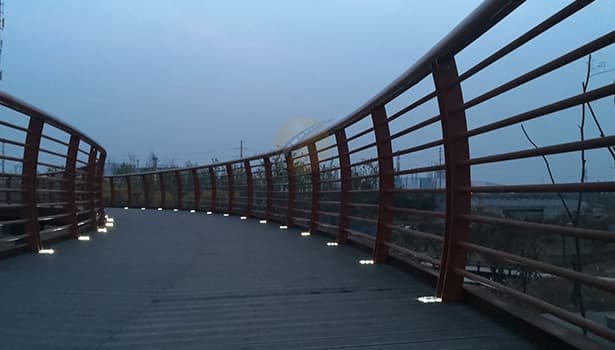 solar road studs on the park illuminate the path for pedestrians