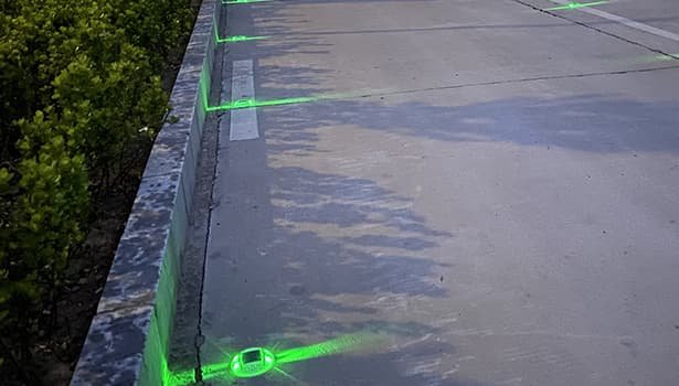 Road studs lighting the cargo route