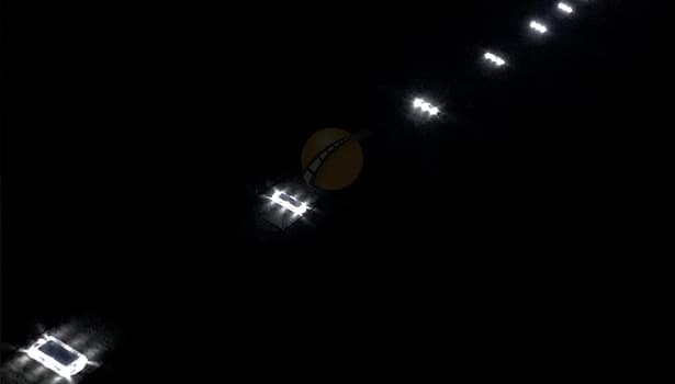 solar road studs illuminating the path for vehicles